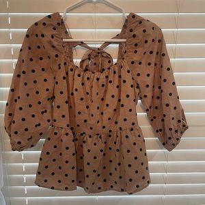 super cute cropped shirt with puffy sleeves and tie bow in the back